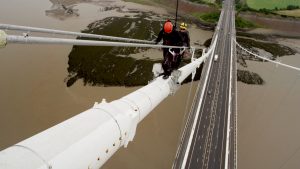 Maintenance workers climbing the Severn Bridge