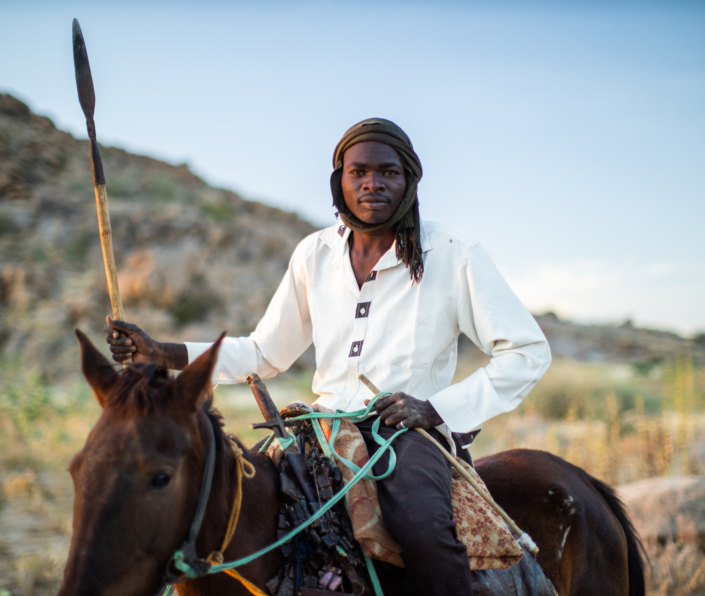 A Dajo warrior on horseback, Darfur.
