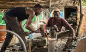 Blacksmiths. Nyala souk, South Darfur, Sudan.